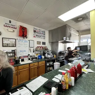 people in the kitchen preparing food