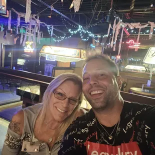 a man and a woman sitting at a table