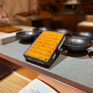 a cook preparing food on the counter