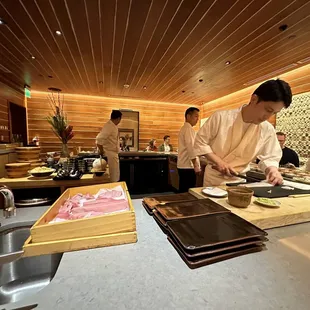 a chef preparing food in a restaurant