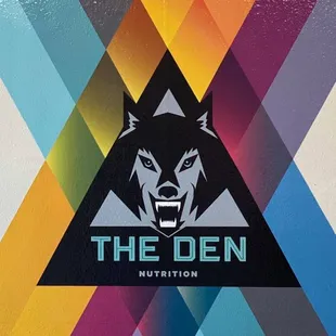 the logo of the den