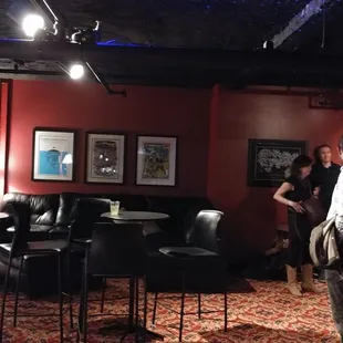 a group of people standing in a room