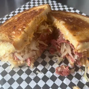 Reuben made with corned beef, Swiss cheese, sauerkraut and house-made Reuben sauce