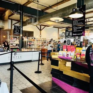 a woman standing in front of the counter
