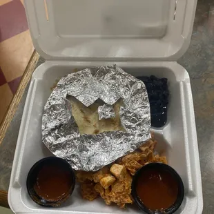 a takeout box of food