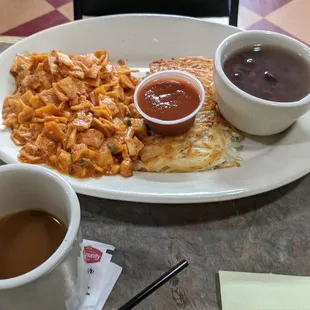 Vegan migas and coffee with almond milk