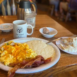 Western Scramble with grits, side of bacon, half order of biscuits and gravy.