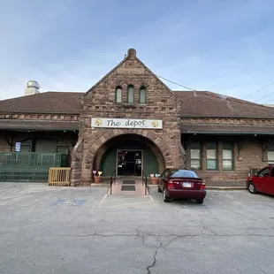 cars parked in front of the station