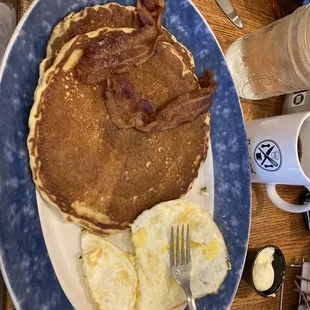 Good pancakes and eggs with well done bacon