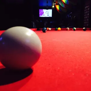 a pool table with a ball on it