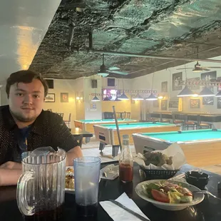 Me and the food we ordered, Side note for Vegetarians: The covered tater tots come with cheese! Thats what my friend was unable to eat.