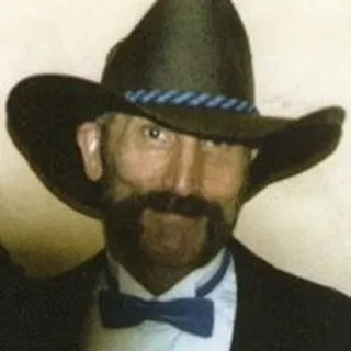 Travis L.