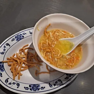 Legit egg drop soup, pipping hot to with the crispy noodles
