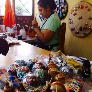 One of our artisans, Dolores Garcia, creating Christmas decor.
