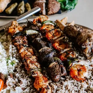 a platter of meat and rice