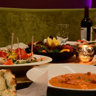 Variety of appetizers, entrees and naan