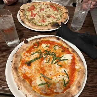 Margherita pizza and chicken pesto pizza