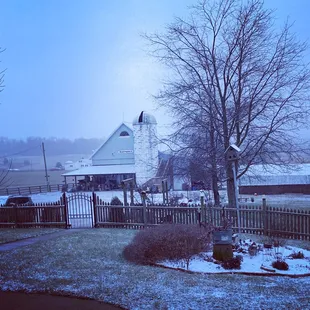 Barn with snow at sunrise
