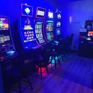 a row of slot machines in a casino