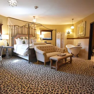a bedroom with a king size bed