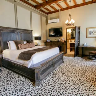 a bedroom with a king size bed
