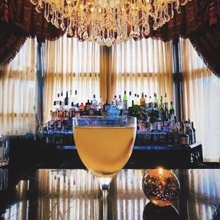 a cocktail in a coupe glass