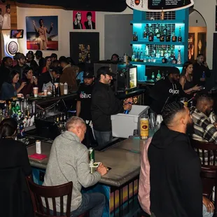 people sitting at the bar