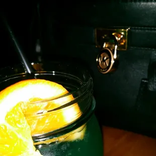 a drink in a mason jar