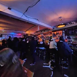 people sitting at the bar