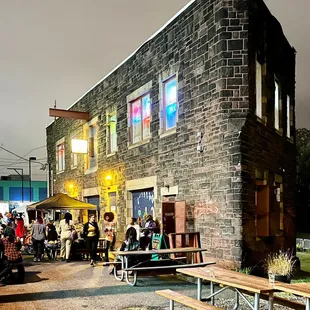 a group of people sitting outside