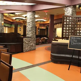 a restaurant with tables and chairs