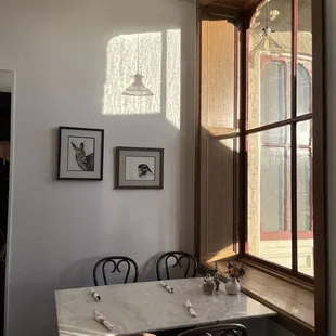 those paintings are for sale. they are beautiful