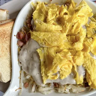 Meat lovers skillet with sausage gravy added on top
