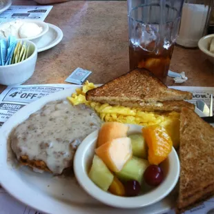 a plate of breakfast food on a table