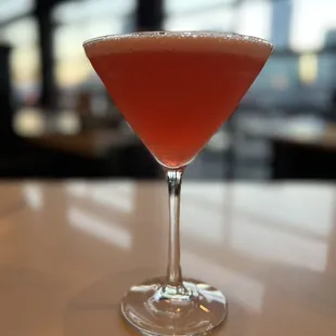 The diner delight Tito&apos;s Vodka, St. Germaine Elderflower Liqueur, Pineapple &amp; Cranberry Juices, Prosecco