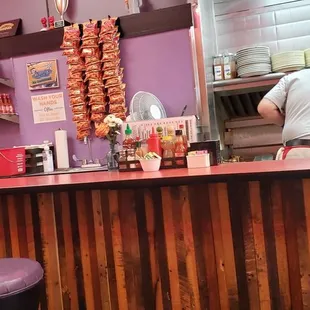 a woman standing at the counter