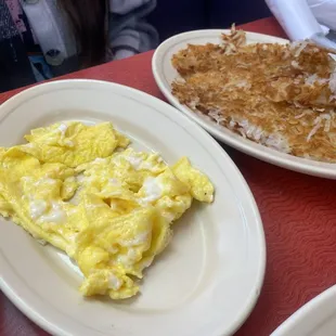 Scrambled eggs and hash browns, best thing we had.