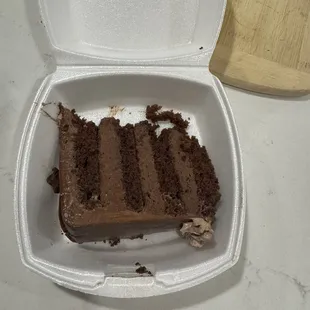 Chocolate cake to go $4.95 plus tax and tip