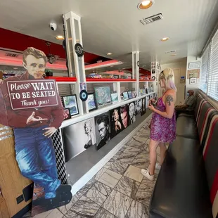 a woman holding a sign