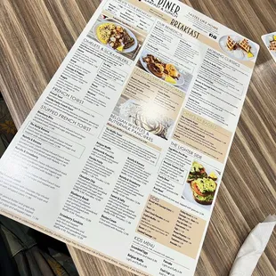 a menu on a wooden table