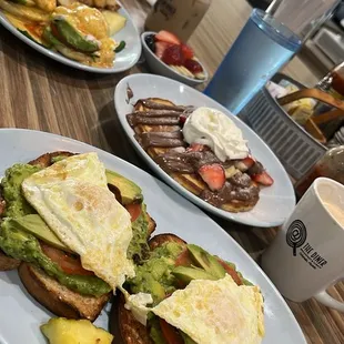 Avocado Tomato Toast with added over medium sunny side up eggs. Delish!!! And the pancakes were so fluffy!