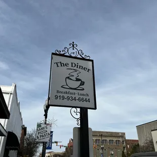 the sign for the diner