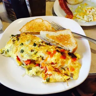 Made to prefer omelette sausage onion bell peppers and cheese.