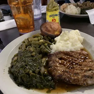 Porto chop, greens, green beans, cream potatoes, corn bread and some tea!