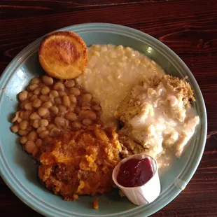 Chicken dressing, sweet potato casserole, acre peas, cream corn and cornbread $6.00