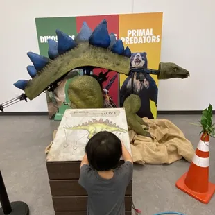 You can push buttons to make this guy move!