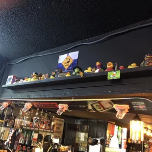 a shelf full of toys