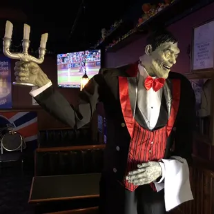 a statue of a man in a tuxedo