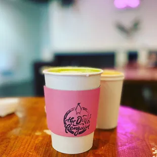 Matcha latte with vanilla (front), cappuccino (back)