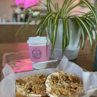 a tray of donuts and a cup of coffee